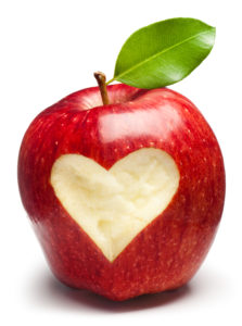 "Red Apple with heart on white. This file is cleaned, retouched and contains"